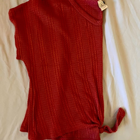 I am selling an orange crop top - Picture 2 of 3